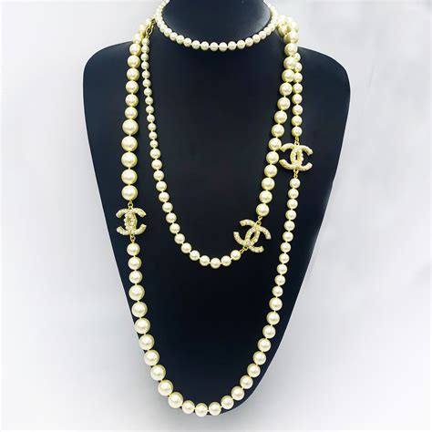 chanel necklace gold pearl|Chanel pearl necklace price list.